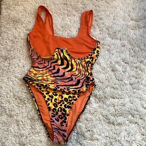 Vibrant one piece swimsuit worn once